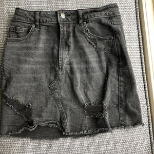 Distressed black denim miniskirt